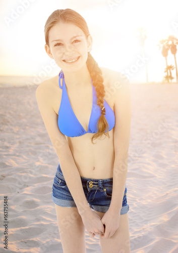 Teen In Bikini Und Hot Pants Macht Urlaub An Strand Und Meer Vintage Flare Lens Buy This Stock Photo And Explore Similar Images At Adobe Stock Adobe Stock