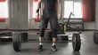 © lenblr - Athlete man doing deadlift exercise in gym.