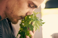 Chef Smelling Fresh Herbs