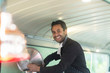 © Connect Images - Portrait of small business owner preparing food in van food stall