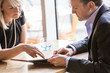 © Connect Images - Businessman and businesswoman working