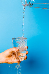 Wall Mural - Image of hand holding glass