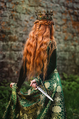 Wall Mural - Woman in green medieval dress