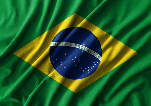 Fototapete - Brazil flag painting on high detail of wave cotton fabrics .