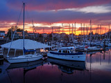 Fototapeta Pomosty - Yachts moored at the marina at the sunset