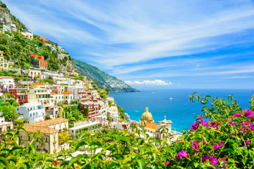 Wall Mural - beautiful view on Positano on Amalfi coast with blurred flowers on foreground