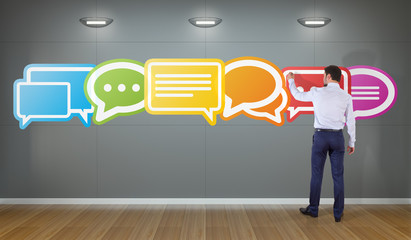 Wall Mural - businessman using social network interface on a wall 3d rendering