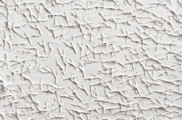 Wall Mural - White decorative abstract plaster texture with cracks, splash, footprints.