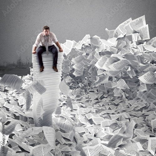 Cuadros en Lienzo Businessman with paper sheet anywhere