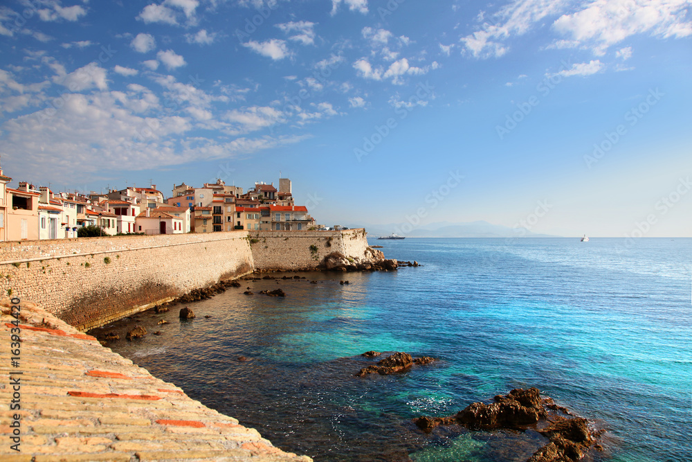 View of seawall in Antibes France - obrazy, fototapety, plakaty 
