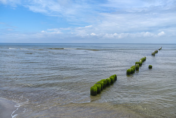 Wall Mural - Baltic Sea - blue sky, wave sea and waterbreak. 