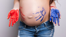 Pregnant Woman Wants To Know Gender Of The Child. Twins, Doubles, Bodyart, Mother Care, Boy Or Girl Concept