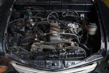 Old Car Engine In Junkyard