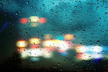 Wall Mural - drop on window car with the rainy night city