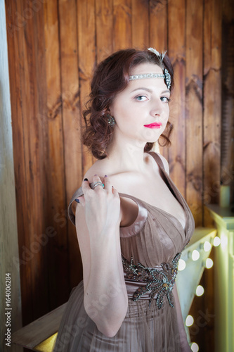 Very Beautiful Girl In An Amazing Vintage Dress With A Rim In Her