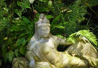 Lovely Statue in a Garden with a Cheeky Lizard