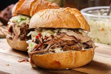 Homemade pulled pork burger with coleslaw salad