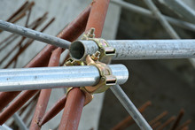 Scaffolding Connector Detail At The Construction Site. The Connector Bind Or Tie Scaffolding Or Safety Pipe Together. 