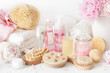 © Olga Miltsova - bath and spa with peony flowers beauty products brush towels