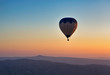 Hot air balloon flight at sunrise.