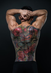 Wall Mural - Asian model with tattoo