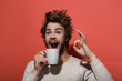 © Volodymyr - ok gesture of surprised man with cup of coffee