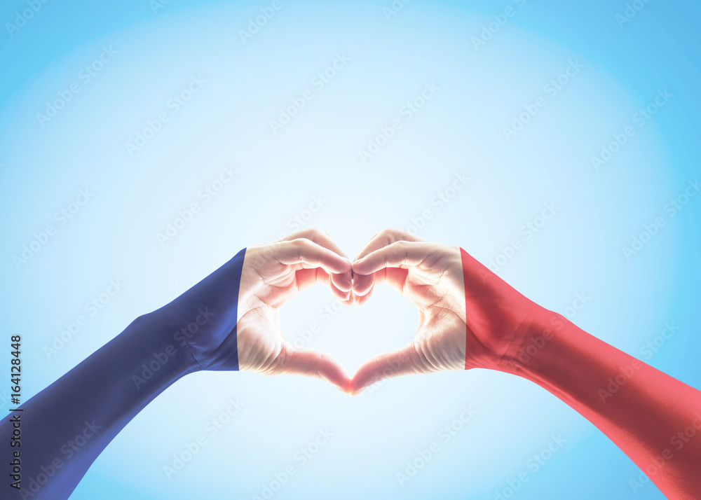 France national flag pattern on people's hands in heart shape on blue sky background (isolated with clipping path) - obrazy, fototapety, plakaty 