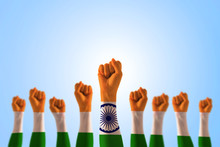 India National Flag Pattern On Leader's Fist Isolated On Blue Sky (clipping Path) For Human Equal Rights, Labor Day Concept
