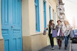 © liderina - Three best friends walking on the street . Young female best friends doing shopping on the streets.