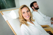 © NDABCREATIVITY - Beautiful woman with handsome man relaxing in spa