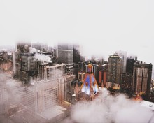 Clouds Covering Buildings In City