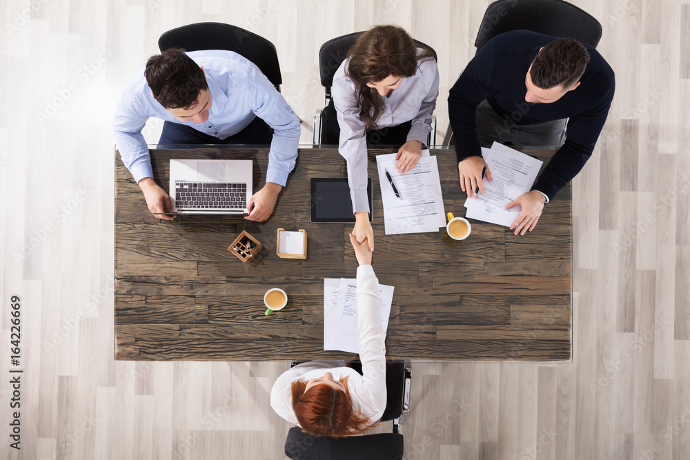 Business People Handshake In Office