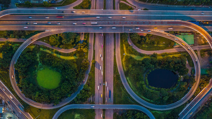 Wall Mural - Bangkok Expressway top view, Top view over the highway, expressway and motorway at night, Aerial view interchange of a city, Shot from drone, Expressway is an important infrastructure in Thailand