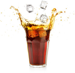 Wall Mural - ice cubes falling into a cola drink splashing 