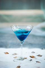 Canvas Print - blue cool refreshing summer cocktail drink with ice  in glass