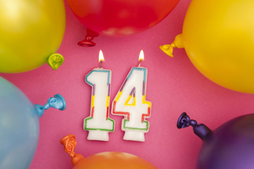 Wall Mural - Happy Birthday number 14 celebration candle with colorful balloons