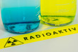 signs for radioactive material and bottles with radioactive chemicals - radiopharmaceutical