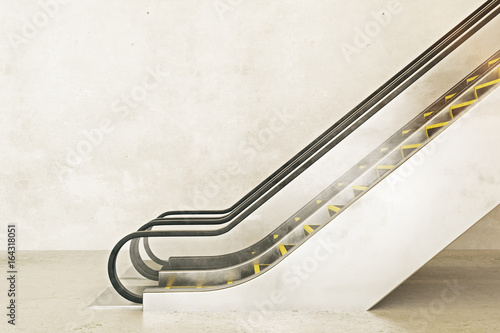 Photographie Escalator on empty concrete background