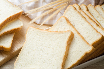 White bread on wood table for morning breakfast