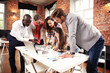 © opolja - Group of five creative worker brainstorm together in office, new style of workspace, happy scene of people in office