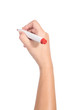 © SUPHANSA - Female hand holding a red marker isolated on white background