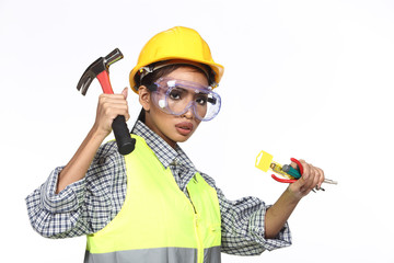 Asian Architect Engineer woman in yellow hard hat,  safety vast equipment, thick gloves, protector glasses goggle and equipment