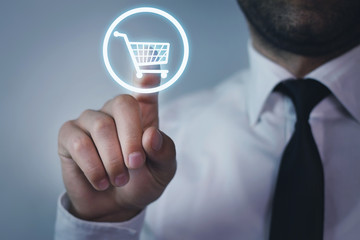 Wall Mural - hand press on shopping cart icon.