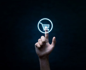 Wall Mural - hand press on shopping cart icon.