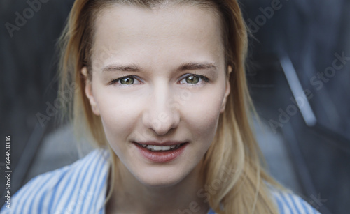 Beautiful Blonde Teenage Girl Smiling Into Camera Green Eyes