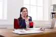 © Prostock-studio - Business talk, woman consulting by phone at office