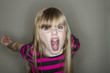 © Tracy King - Young girl screaming at the camera