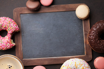 Canvas Print - Chalkboard, coffee cup and colorful donuts