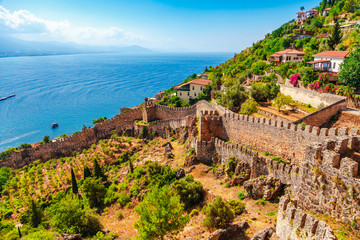 Wall Mural - Beautiful sea panorama landscape of Alanya Castle in Antalya district, Turkey, Asia. Famous tourist destination with high mountains. Summer bright day and sea shore