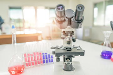 Wall Mural - Microscope on the table in laboratory room with laboratory equipment